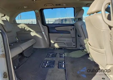 2014 Honda Odyssey Touring z USA, uszkodzony, nr VIN 5FNRL5H95EB024723